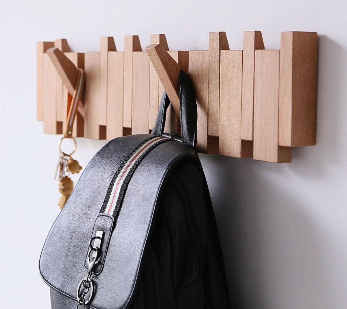 handcrafted-piano-inspired-wooden-wall-coat-rack-with-foldable-hooks-img10.jpg