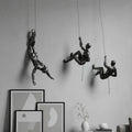handcrafted-resin-climbing-figure-wall-sculpture-img1.jpg