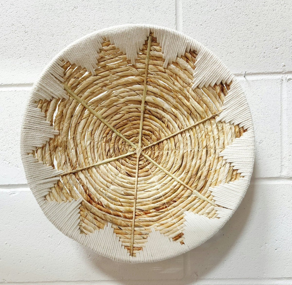 handwoven-seagrass-basket-with-tribal-wall-art-img2.jpg