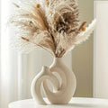 modern-boho-ceramic-vase-set-in-elegant-white-porcelain-img1.webp