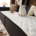 quilted-microfiber-sofa-slipcover-with-non-slip-backing-img1.jpg