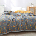 reversible-quilt-blanket-nature-inspired-breathable-easy-care-img1.jpg