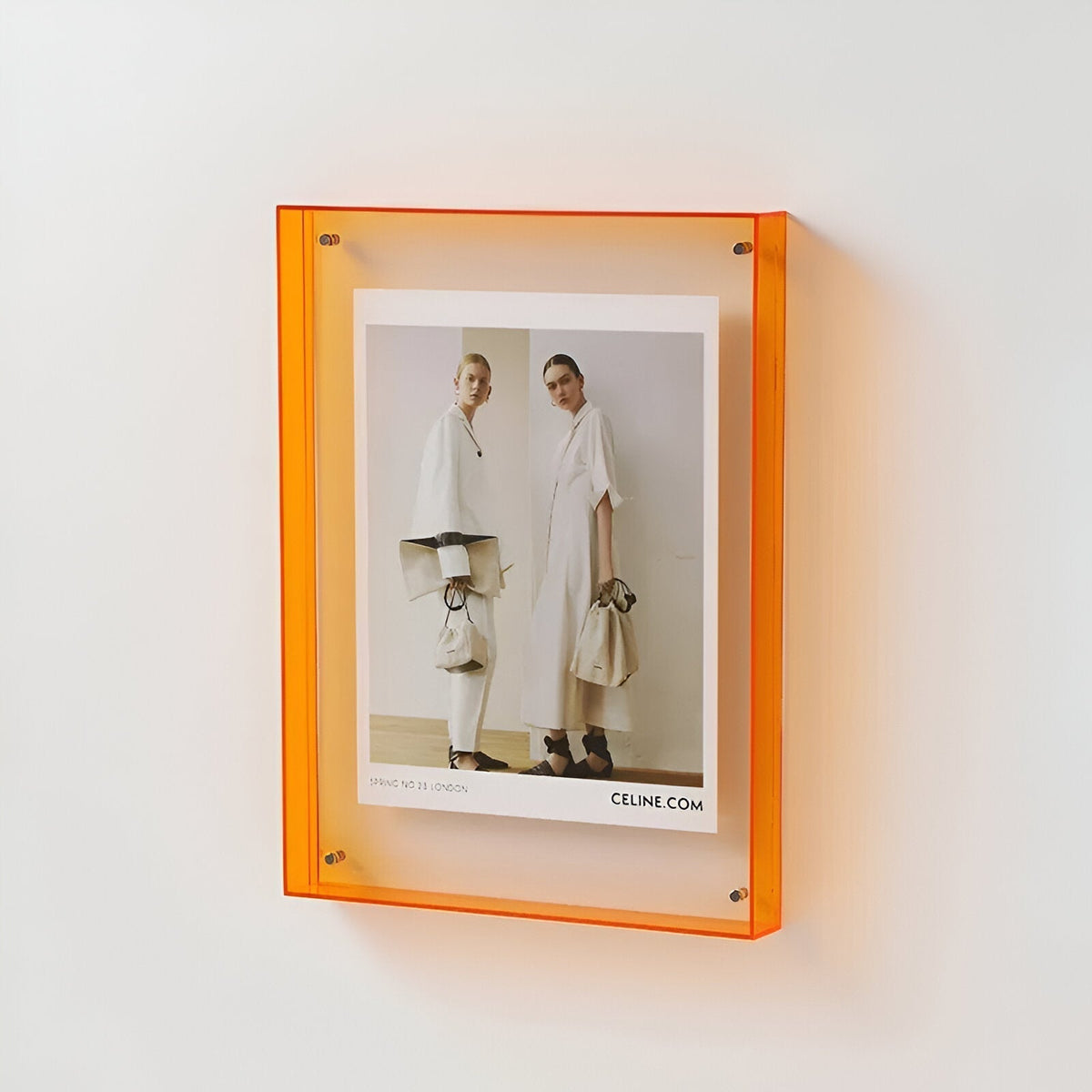 transparent-acrylic-photo-frame-with-sculptural-minimalism-img4.jpg